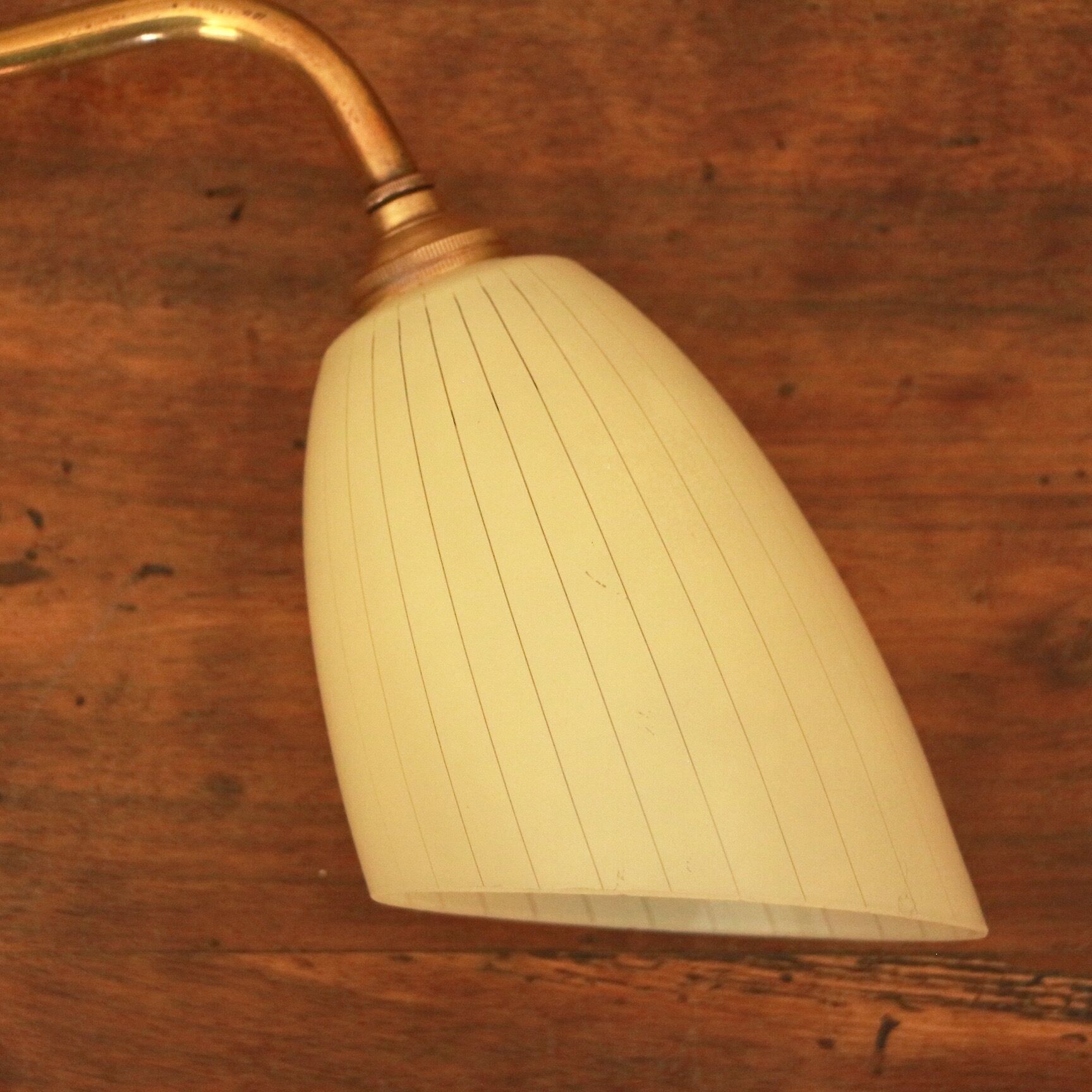 Brass and glass sconce
