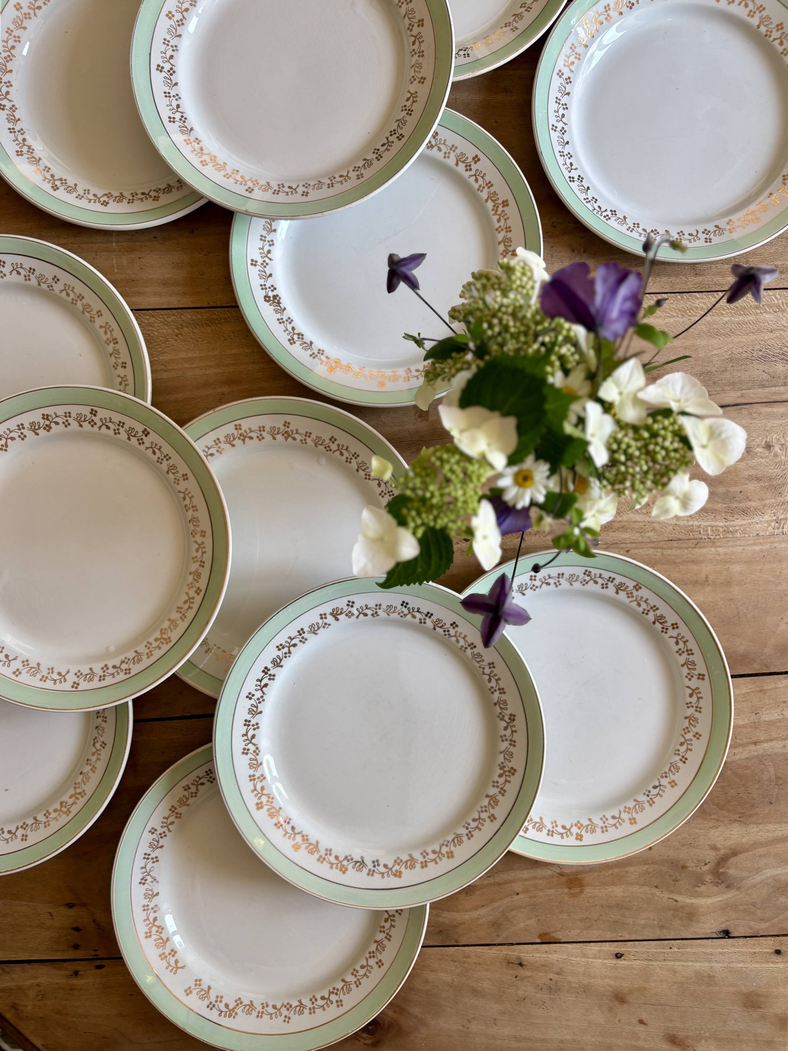 Set of 12 white, mint and gold flat plates, Mosèle de Lunéville