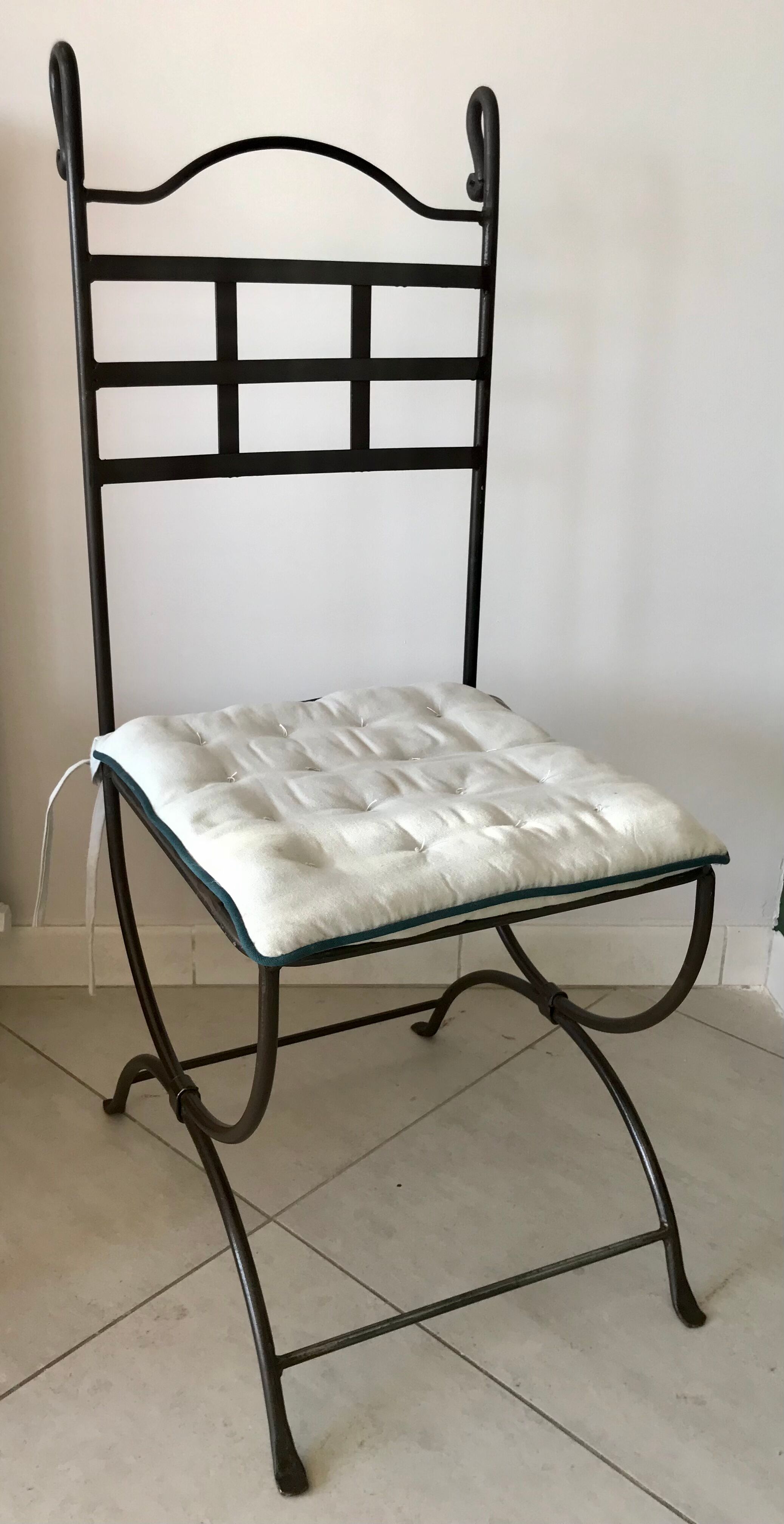 Six wrought iron chairs