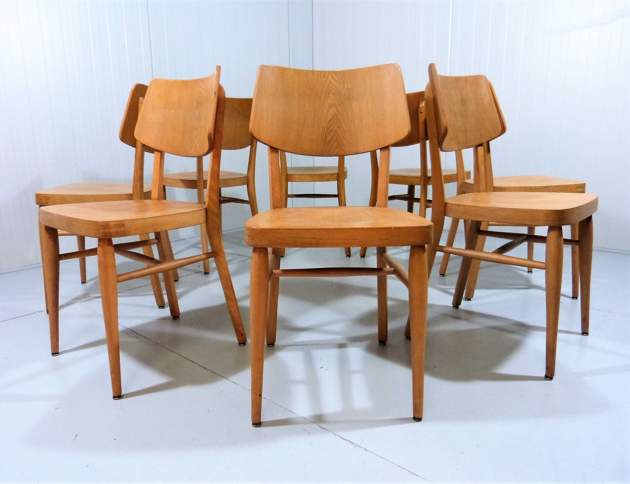 Set of 8 wooden dining chairs 1950’s