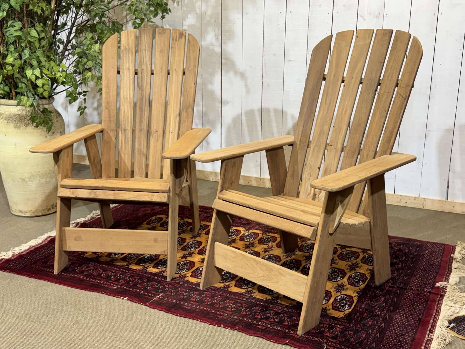 Pair of Indian teak armchairs
