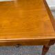 Vintage solid wood desk with removable secretary in colonial style from the 1960s.