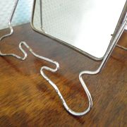 Two-foot barber mirror, suspension mode, beveled, chrome metal - 70s -