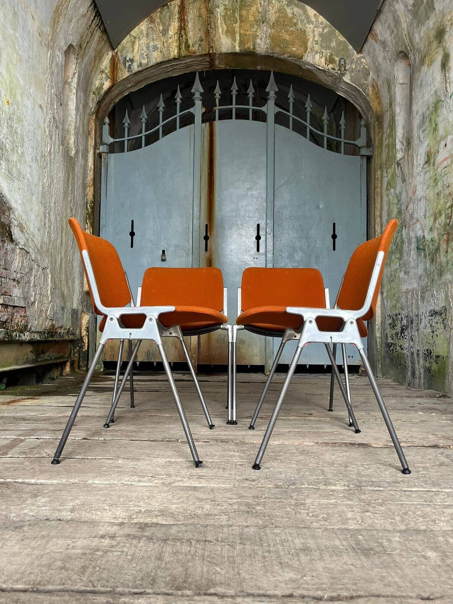 DSC 106 chair in orange by Giancarlo Piretti for Castelli, 1970s.