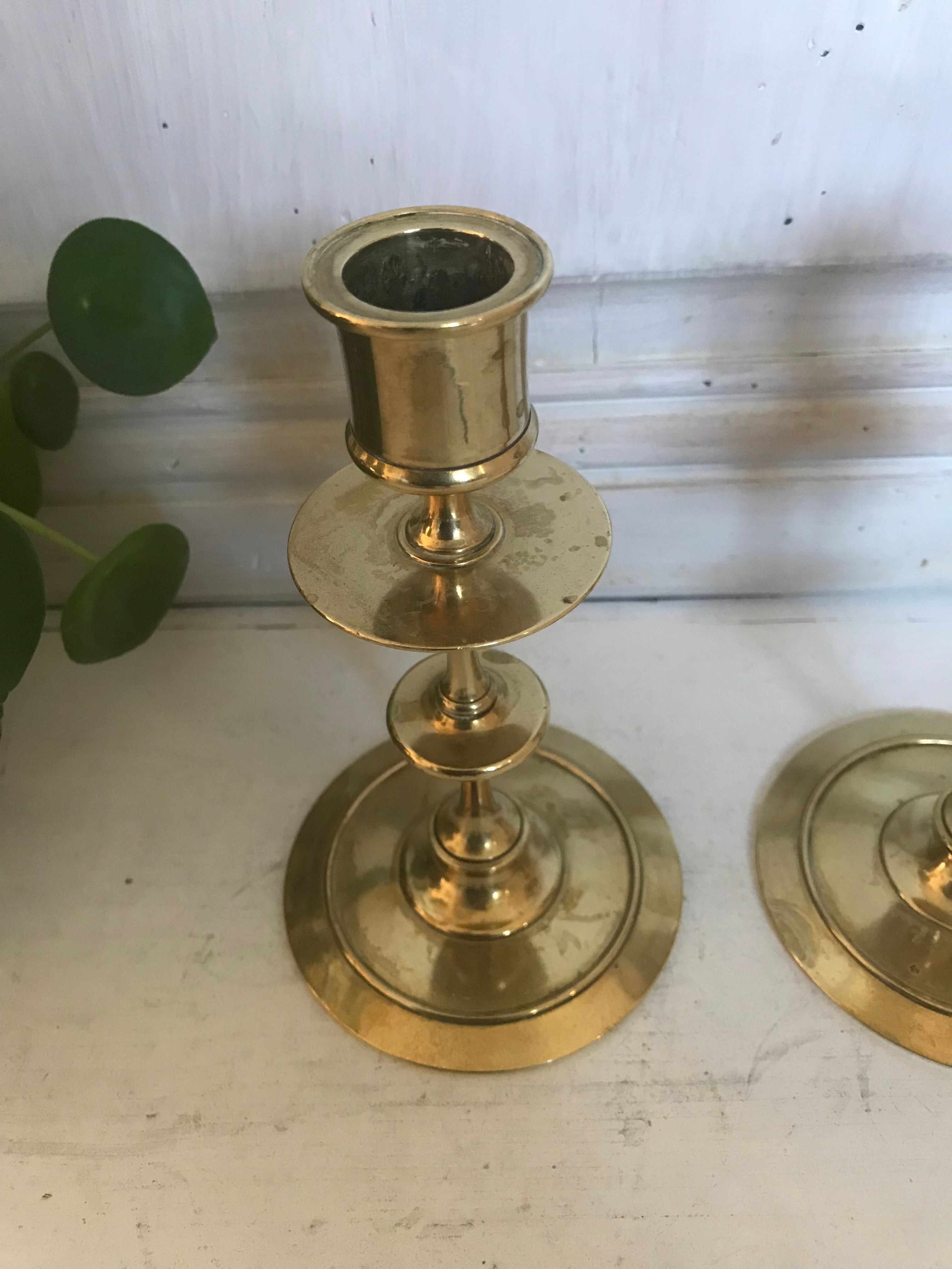 Pair of brass candle holders