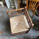 Corner chair in turned wood and straw
