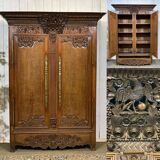 19th-century Norman wedding armoire in blonde oak.