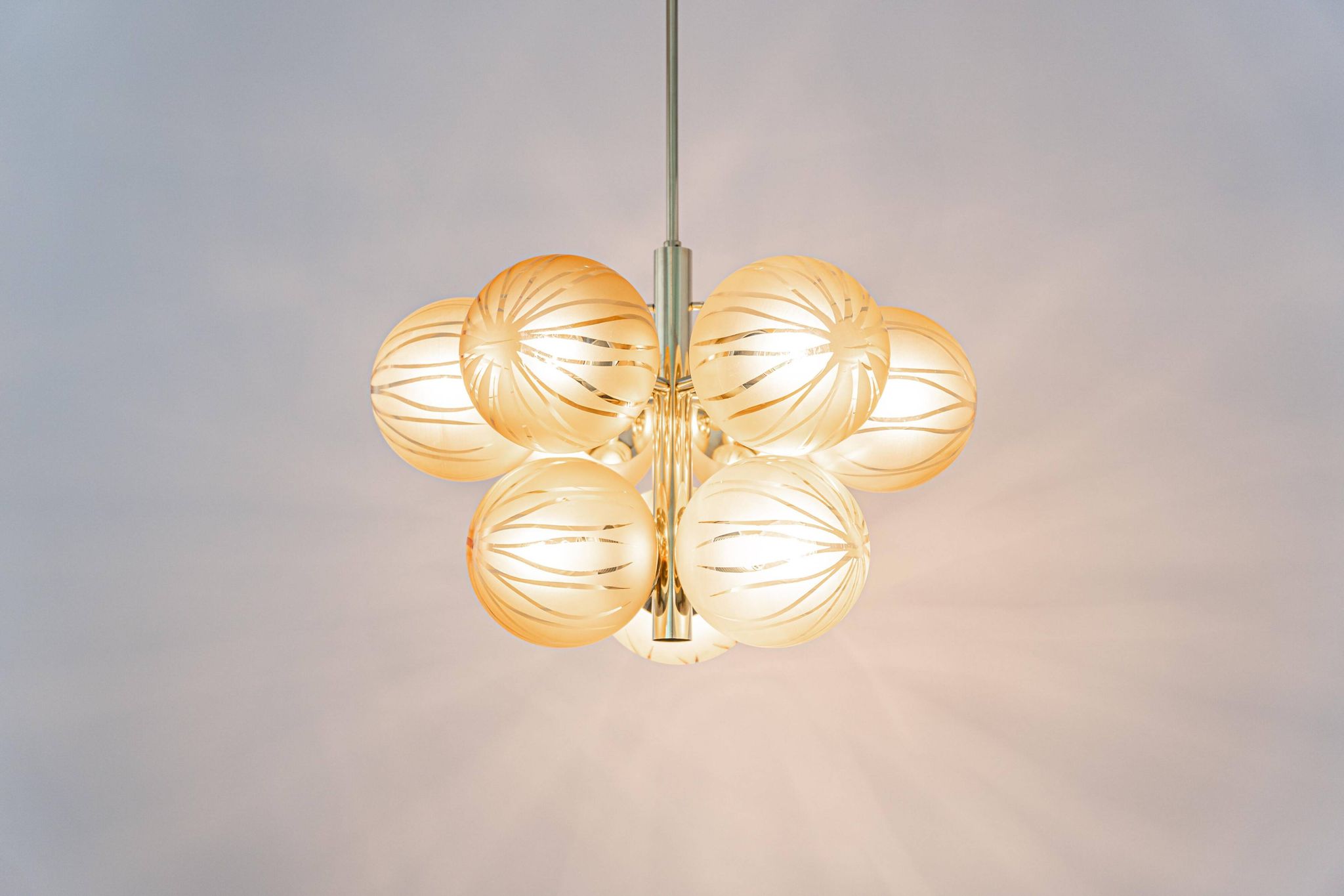 Large Sputnik chandelier in opaline and brass, Germany, 1970s.