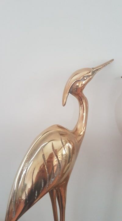 Pair of birds couple of brass herons