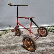 Riveted metal children's tricycle 1920 • Urbex style