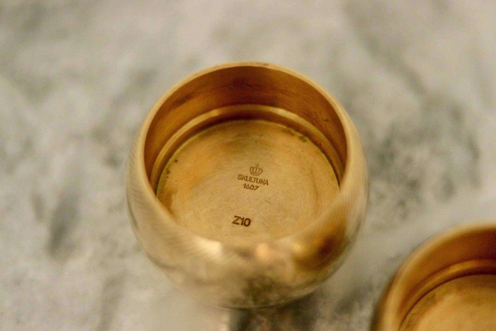Pair of Swedish brass candlesticks from the mid-century by Skultuna.