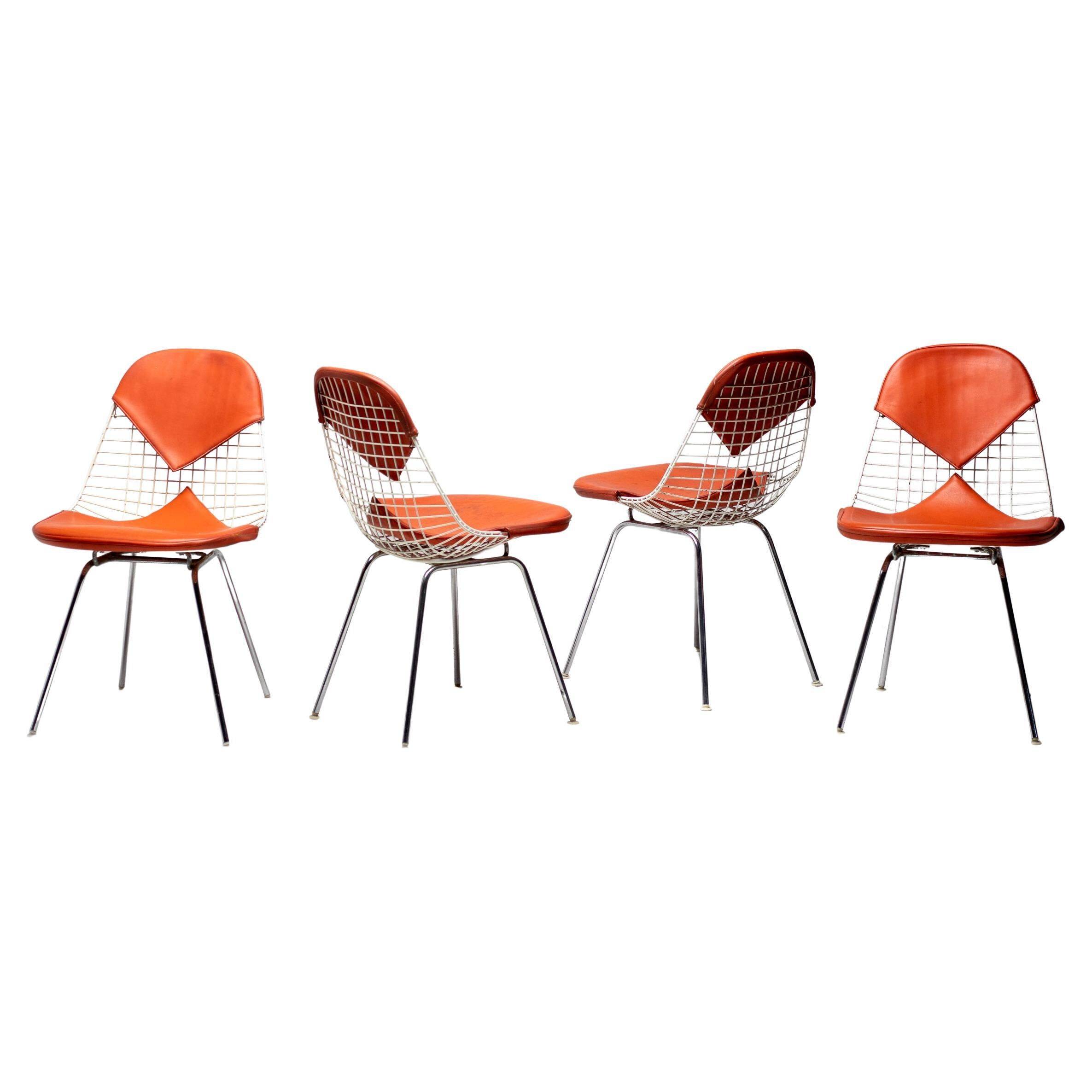 Set of 4 Eames wire chairs for Herman Miller with original Bikini seats by Girard.