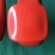 Pair of Patère coat rack Syla France plastic orange design 70s