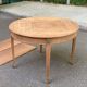 Round extendable dining table stripped in cherry wood with Louis XVI marquetry 1