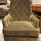 Mid-century buttoned armchair with metal legs