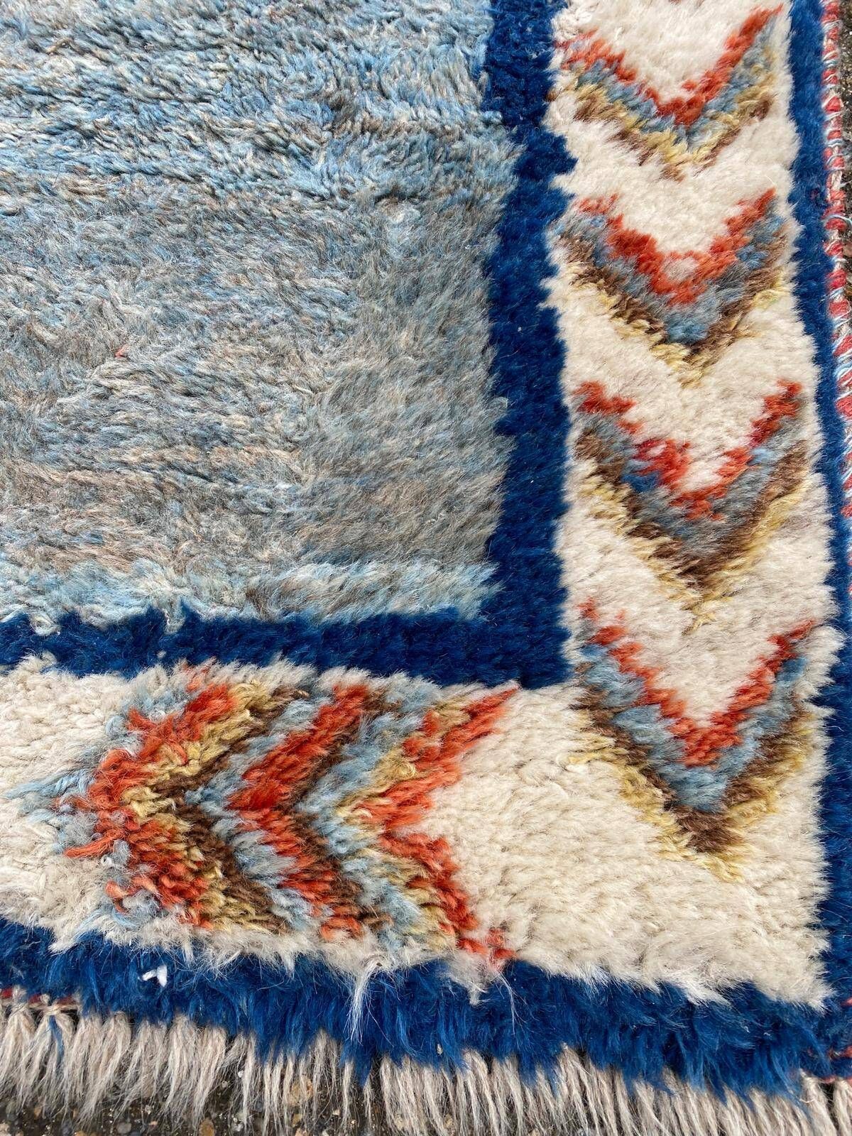 Handmade wool Berber rug with long pile, 110x150cm.
