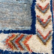 Handmade wool Berber rug with long pile, 110x150cm.