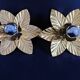 Paire d'appliques feuilles dorées