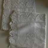 Pair of 19th century linen thread pillowcases embroidered with scallops