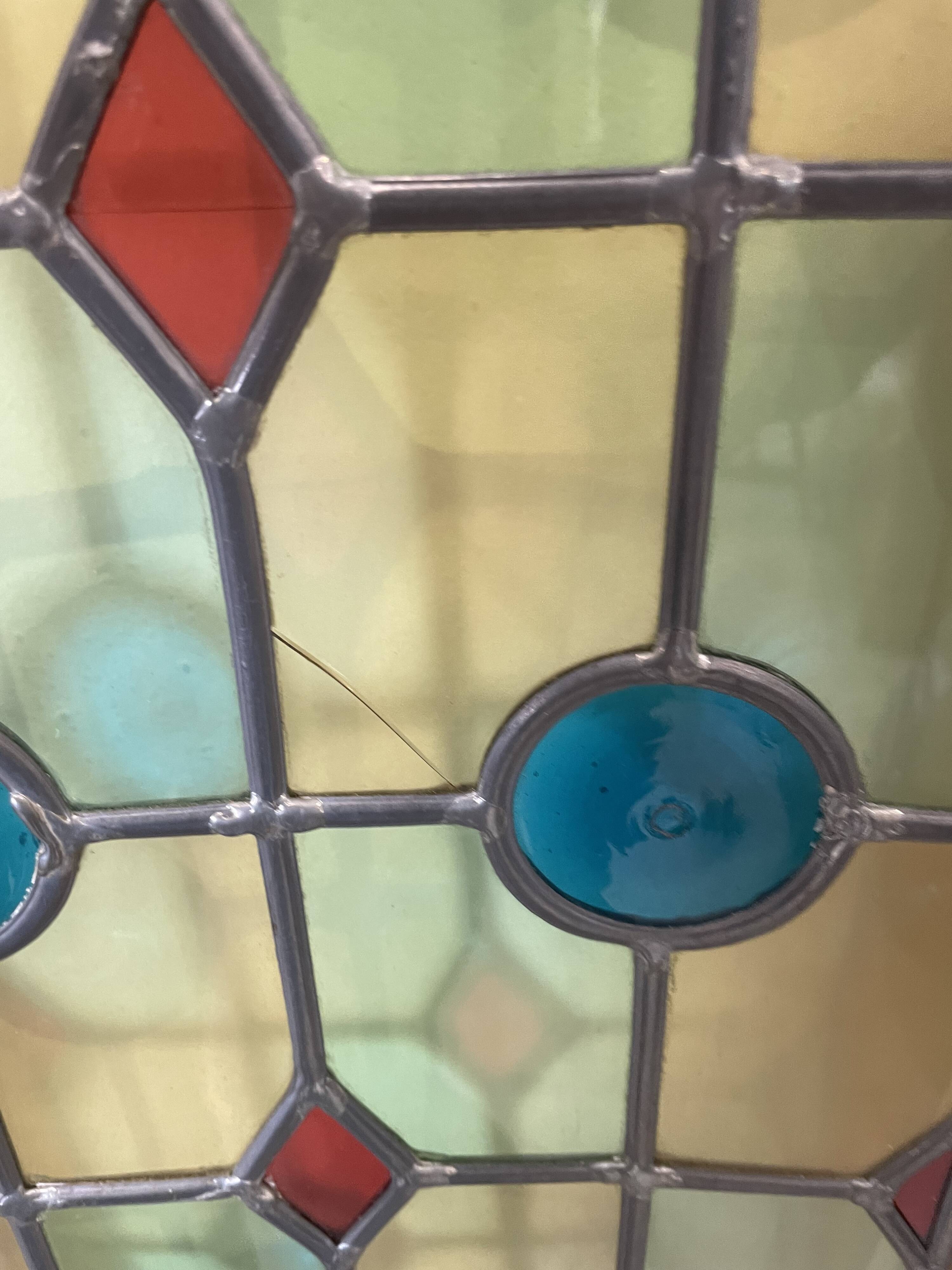 4 vintage faux stained glass panels that can form a screen or a partition