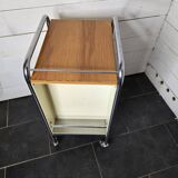 Mid-20th century metal cabinet table on wheels