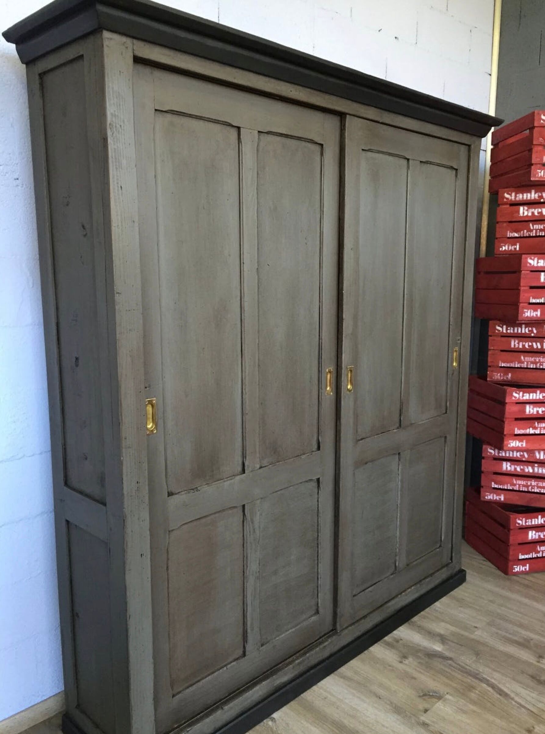 Old wooden cupboard massive sliding doors