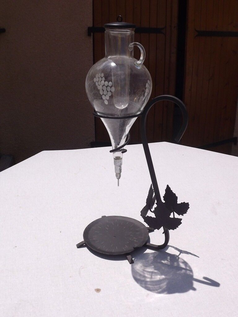 Iron and glass wine decanter