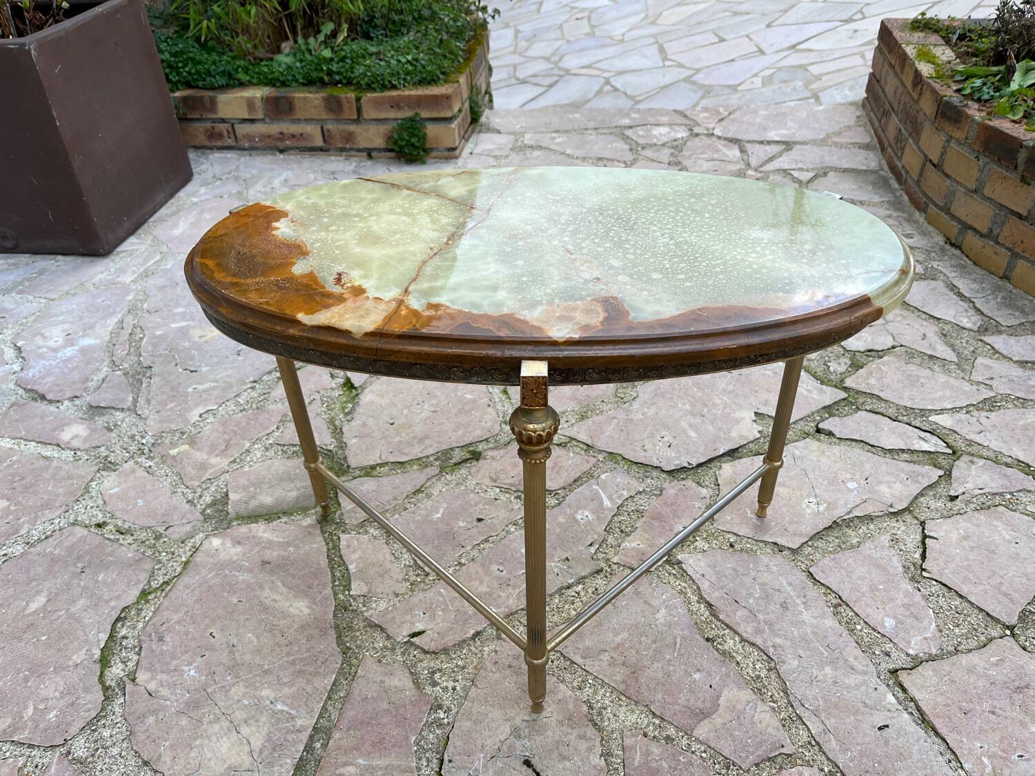 Bronze coffee table with marble top