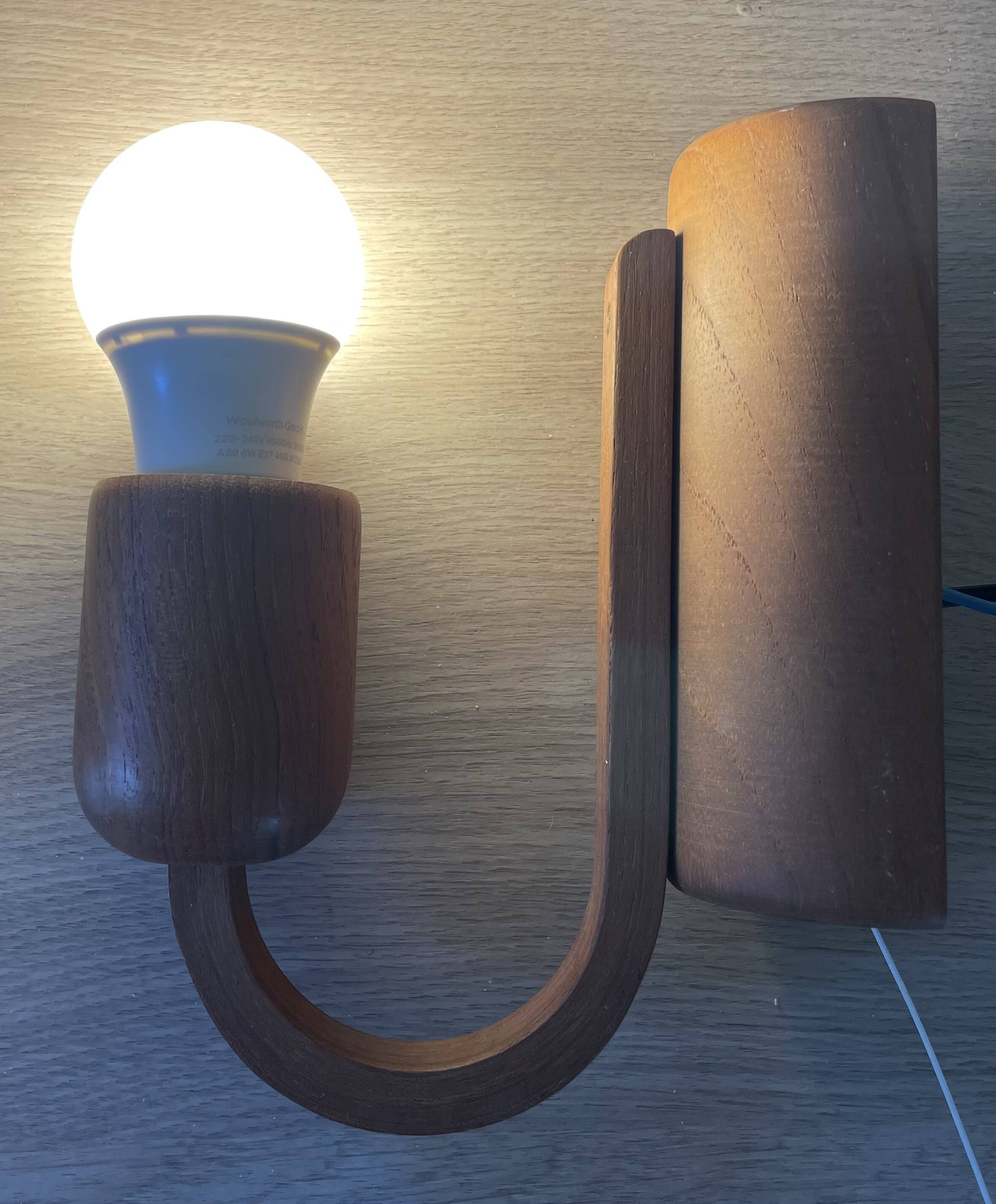 Pair of Scandinavian teak wall lights, Dolmus, 70s
