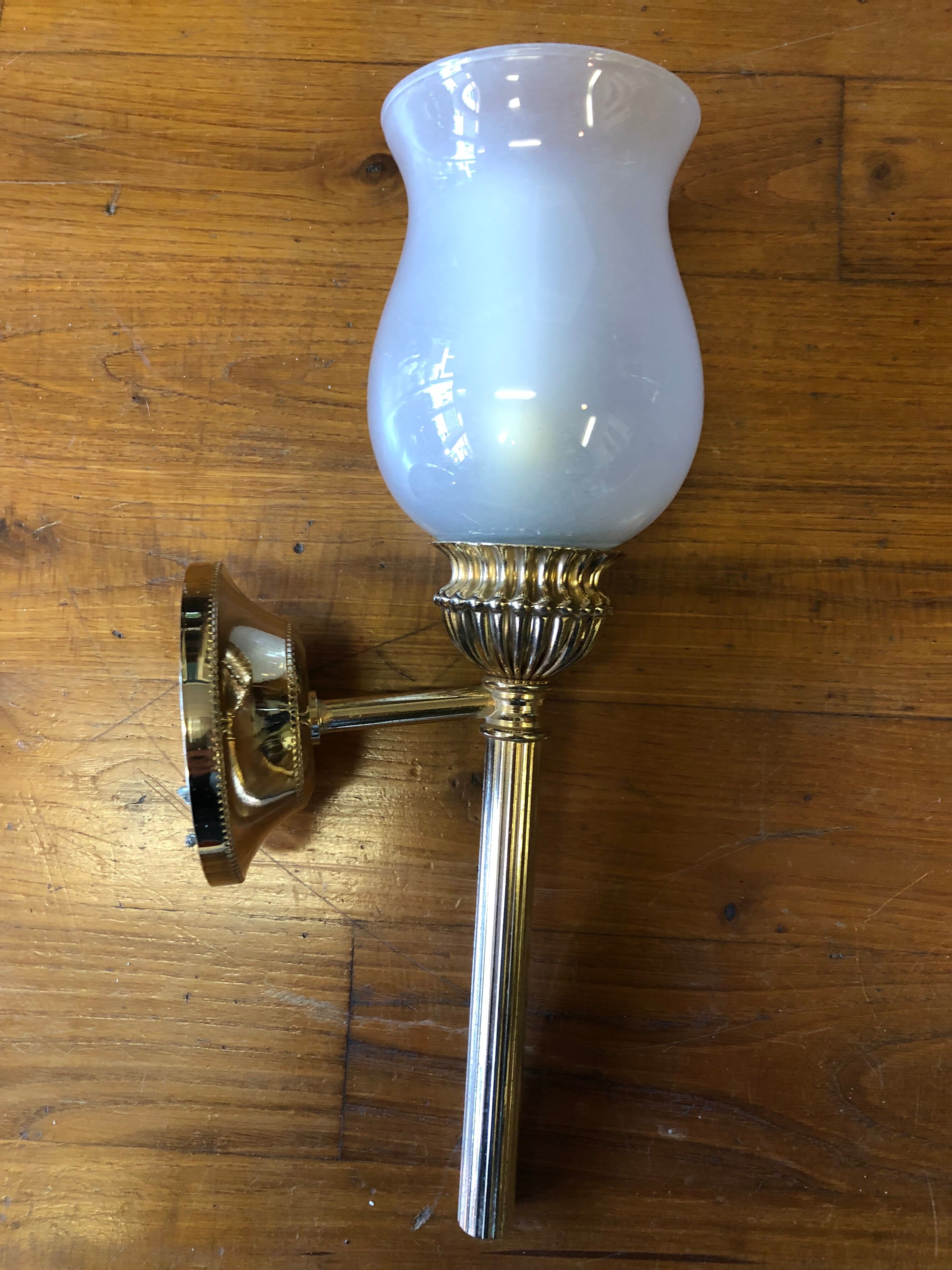 Pair of brass and opaline wall lamps