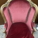 Fauteuil en bois doré et repose pieds