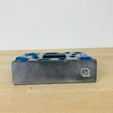Decorative metal box and blue glass