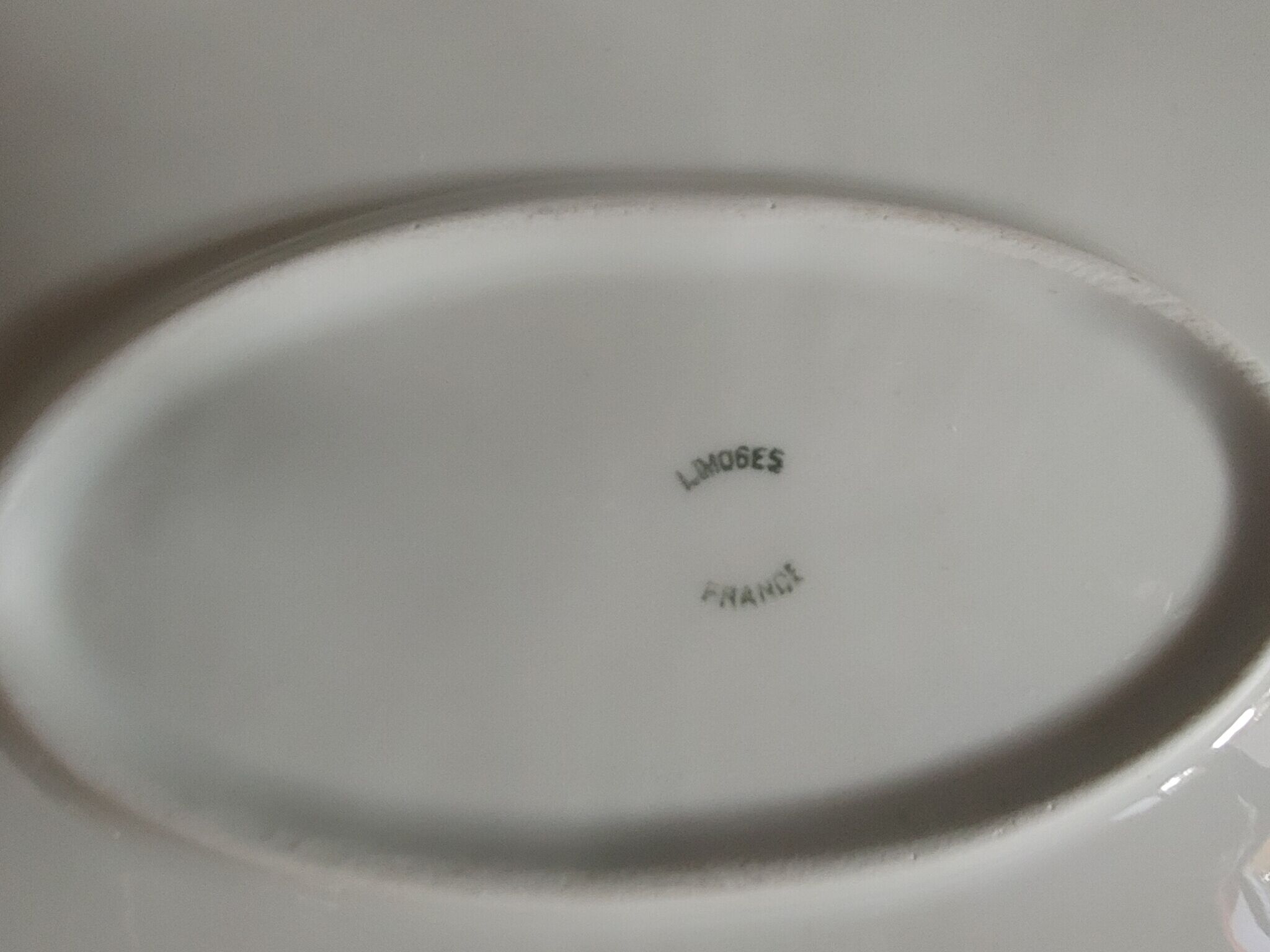 Large serving dish in Limoges porcelain Flower baskets, fruit - early 20th