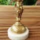 cherubic bronze lamp foot on marble base