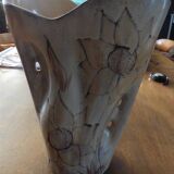 Beige colored vase from the vallauris brand with flower pattern