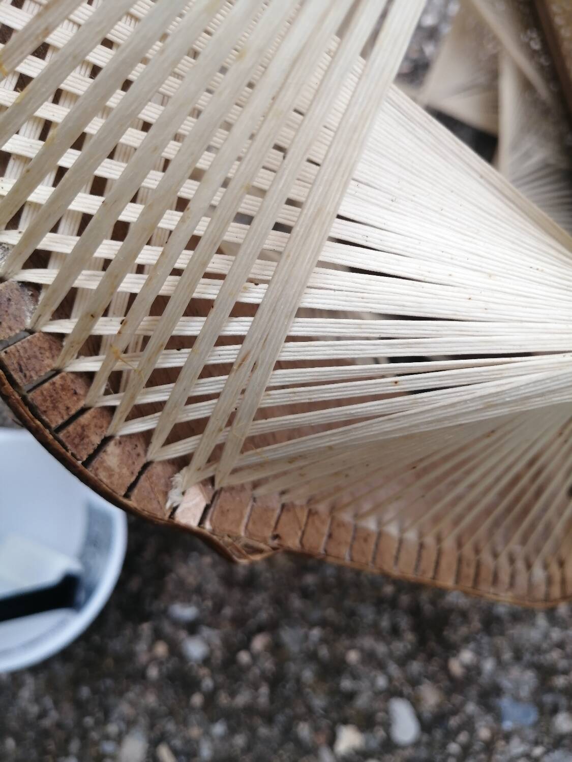 Pair of vintage wooden and rattan straw pendant lights.