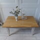 Vintage coffee table patinated pearl gray waxed finish, top against glued varnished oak