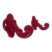 Pair of vintage wall hooks in enamelled cast iron.