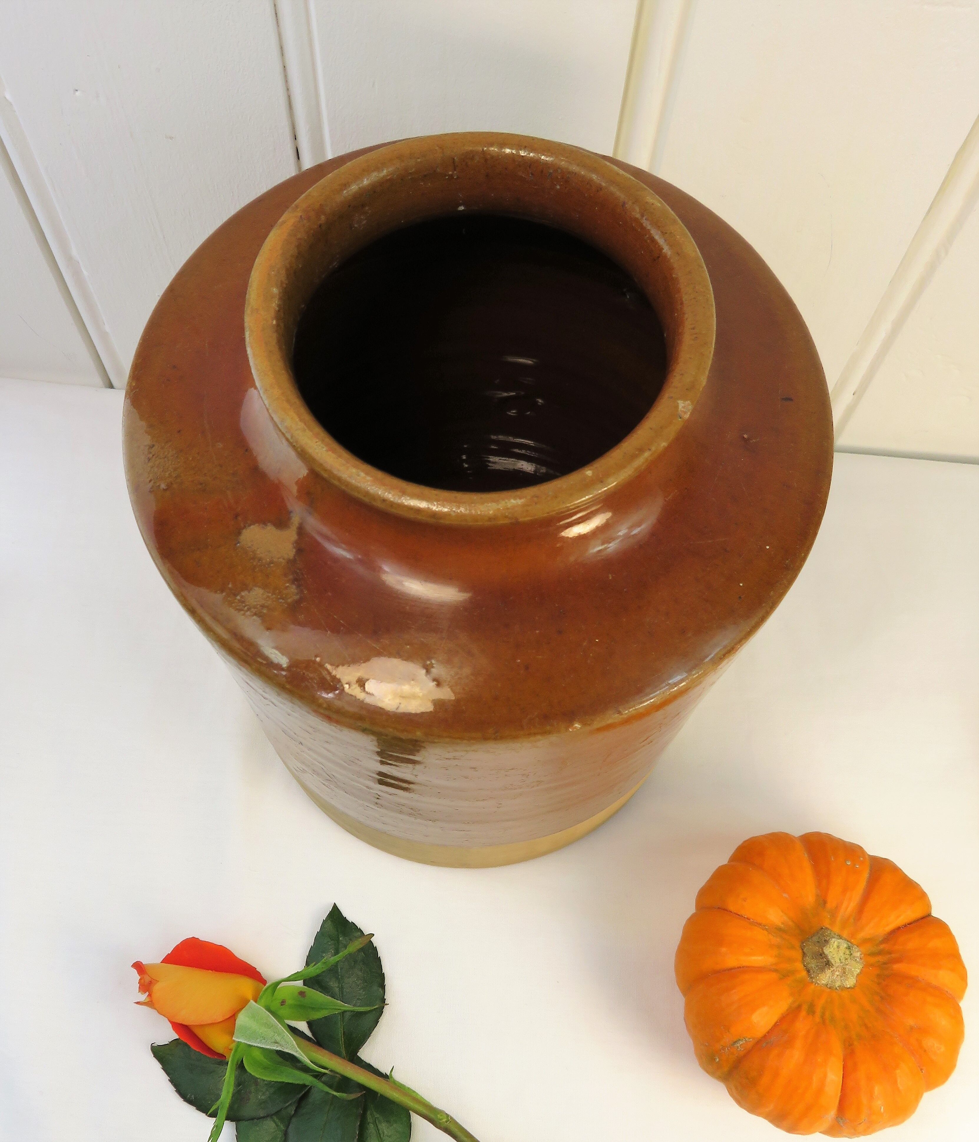 Old grease pot in glazed stoneware and terracotta