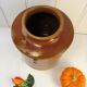 Old grease pot in glazed stoneware and terracotta