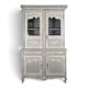 Two-body glass buffet in patinated grey and white oak.