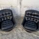 Pair of vintage swivel armchairs in black leather Tulip foot