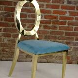 Gold chair with turquoise velvet seat