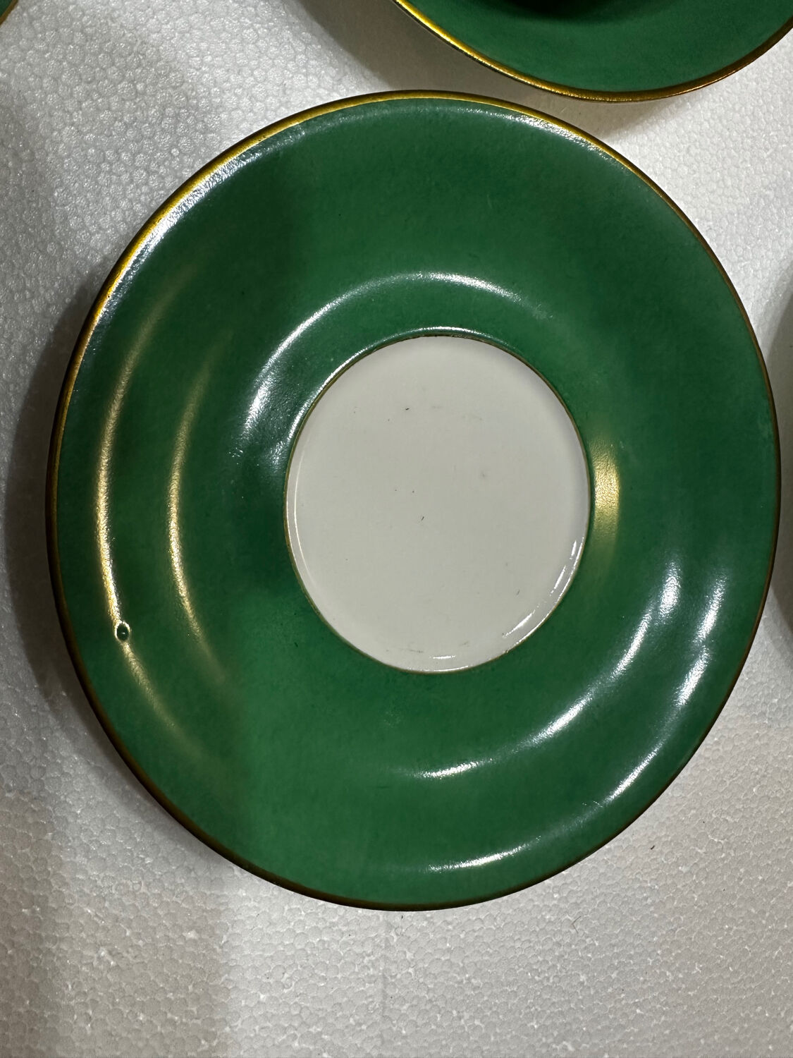 Service 14 cup and saucer in Art Deco Emerald Green and Gold.