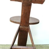 Regionalist wooden tripod chair