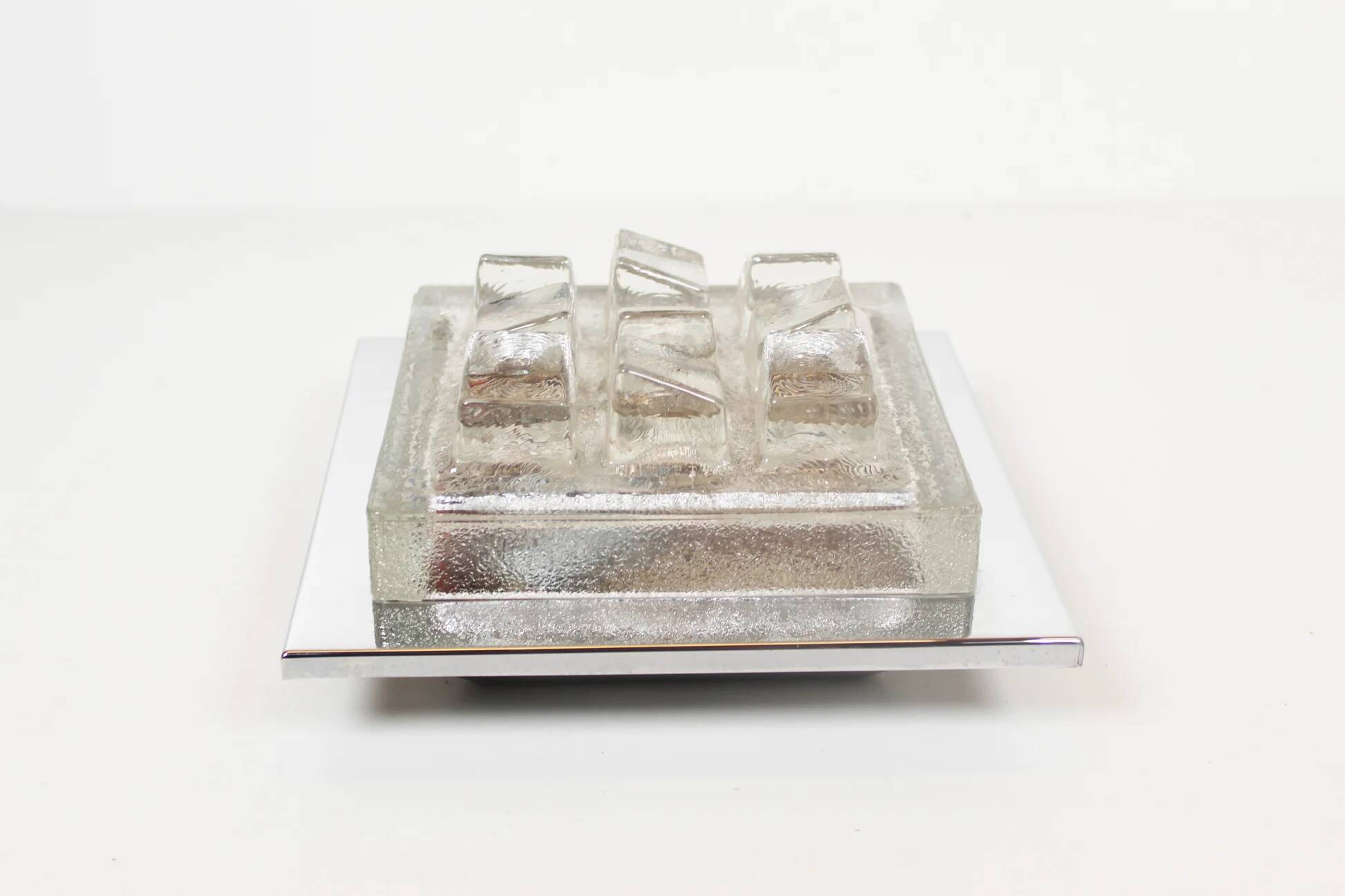 Single 1970s brutalist glass wall sconce by Hillebrand