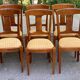 6 Syriel solid cherry wood dining chairs with yellow fabric.