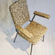 2 small black and white armchairs