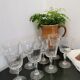 Set of 8 wine glasses with cut feet