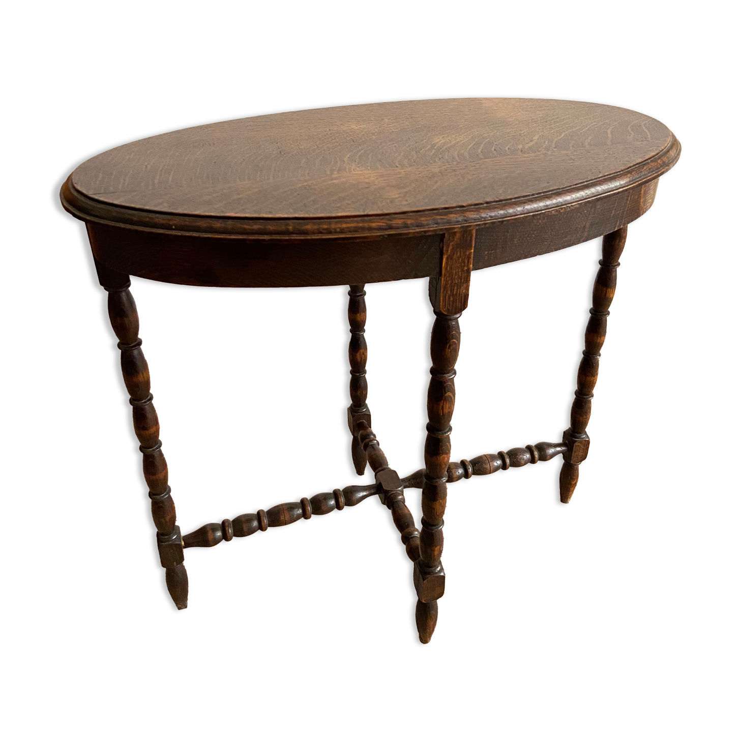 Oval wooden side table turned with spacer